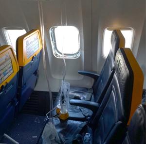 Ryanair CEO disputes report that an injured passenger was partly sucked out a shattered window