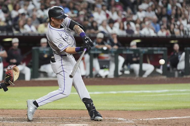 Beck homers twice and Tovar gets 5 hits as Rockies rally past Diamondbacks 14-12