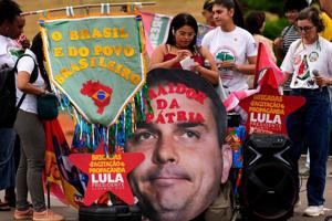 The Latest: Brazilians vote in presidential election dominated by Lula and Bolsonaro
