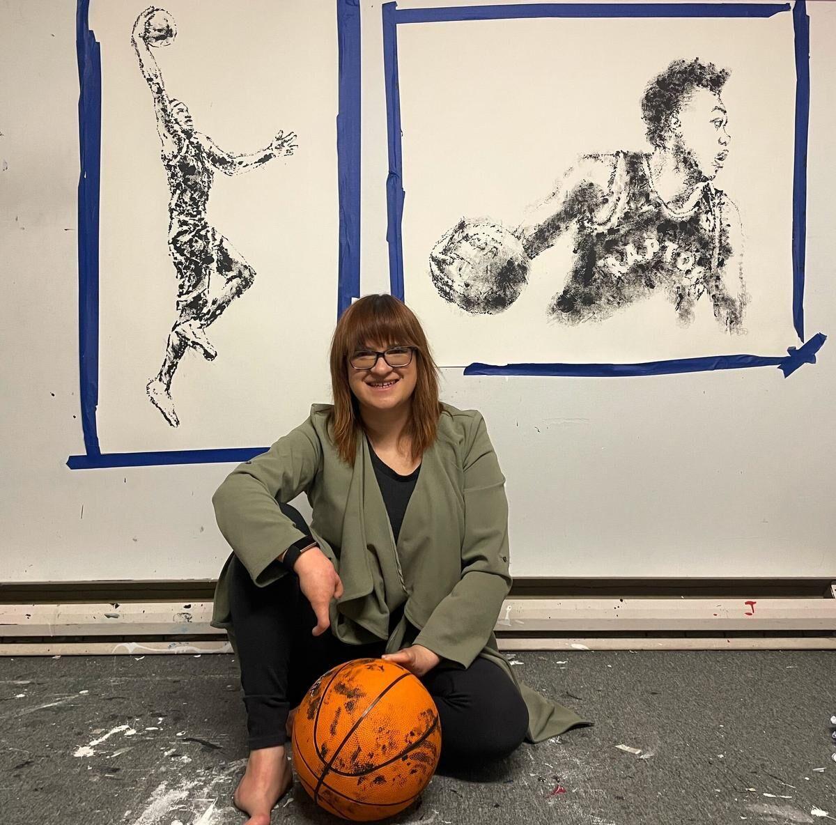 Canadian artist paints Raptors using a basketball as a brush