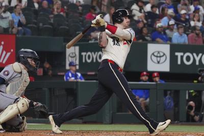 Rangers place outfielder Evan Carter on IL with quad strain, activate Kevin Pillar