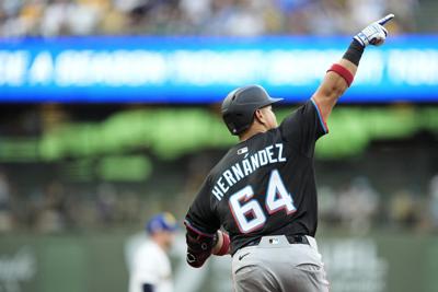 Heriberto Hernandez his go-ahead 3-run HR as Marlins beat Brewers 7-4