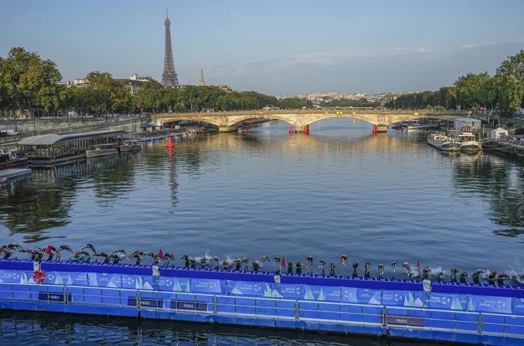 Concerns over water quality in Paris’ Seine River postpone men’s