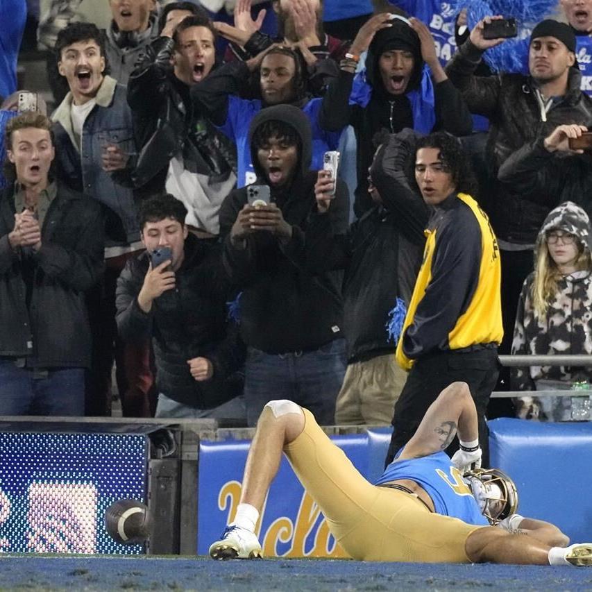 Steelers fan chokes pregnant Chargers fan at game, photos and