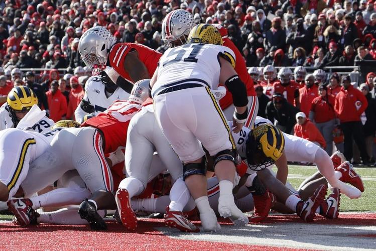 Michigan, Ohio State fight broken up with police pepper spray after