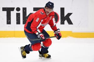 Wilson scores twice as the Capitals beat the Islanders 4-1 for their 4th straight win