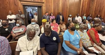 Slave descendants vow to fight on after Georgia county approves larger homes for island enclave Slave descendants vow to fight on after Georgia county approves larger homes for island enclave