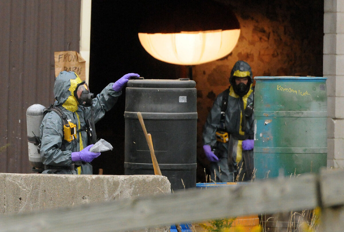 Hazmat team checks mysterious barrels at Dellen Millard's farm