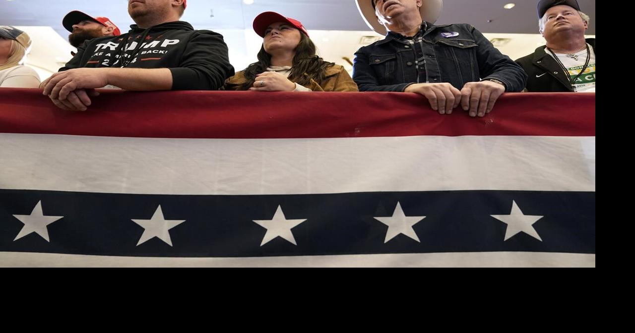 With Iowa's caucuses a month away, Trump urges voters to hand him not just a victory, but a blowout