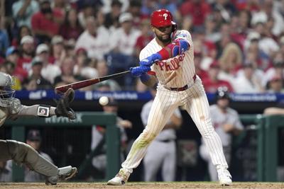 Phillies claim another wild, walk-off win on catcher's interference with bases loaded in 10th