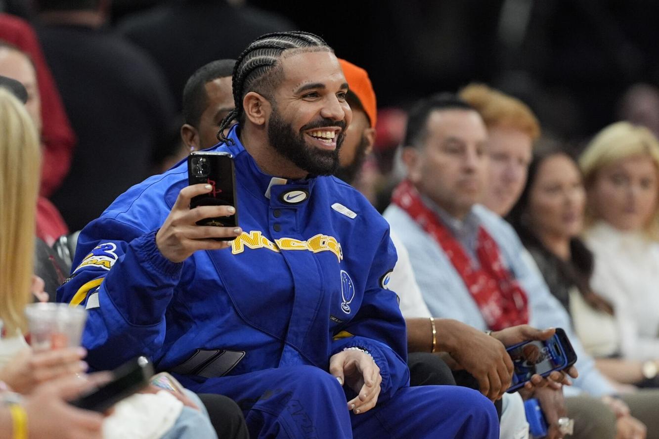 Drake freezes Toronto’s CN Tower icy blue for ‘Iceman’