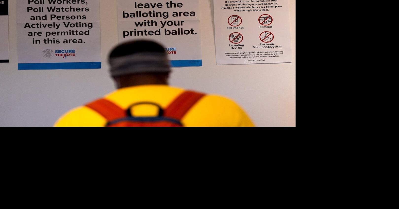FACT FOCUS: Social media posts falsely claim ballots marked by a poll worker will be disqualified