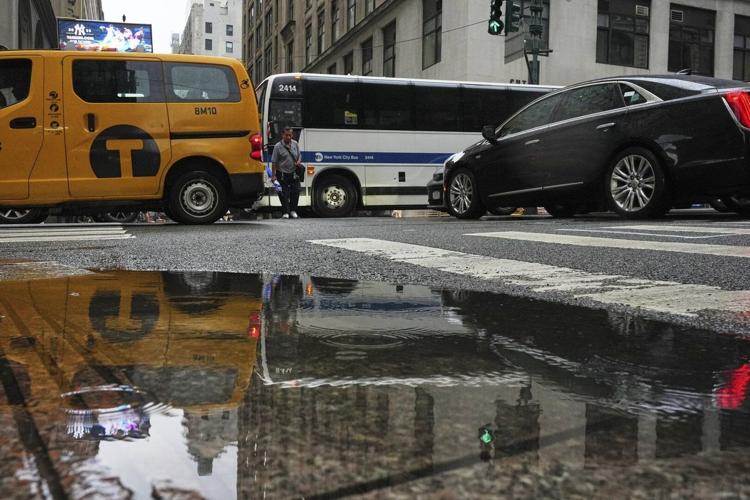 Boy, 13, dies after getting trapped in a storm drain during East Coast flooding