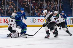 Joshua scores 12th of season, Canucks beat Coyotes 2-1 for sixth win in seven games