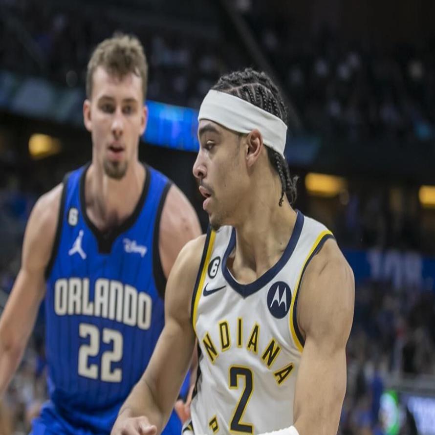Indiana Pacers forward Serge Ibaka (25) grabs for the rebound against  Orlando Magic center Moritz Wagner, front right, during the first half of  an NBA basketball game Saturday, Feb. 25, 2023, in