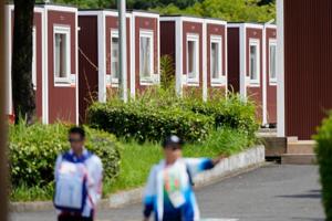 Officials defend using temporary containers, cruise ship as lodging at Asian Games