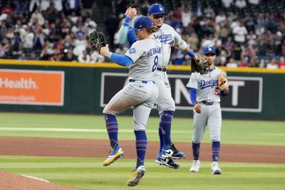 Dodgers clinch 12th NL West title in 13 years with 8-0 win over Diamondbacks