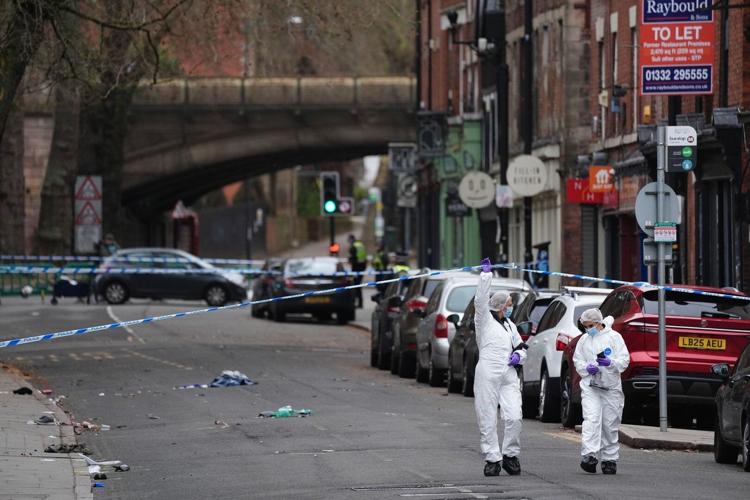 Man charged after a car plowed into a crowd outside a British pub