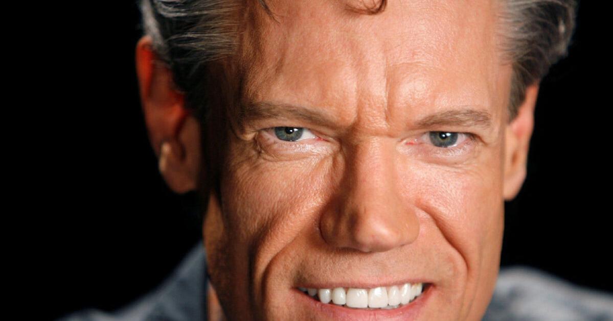 Randy Travis arrested after found naked at scene of car