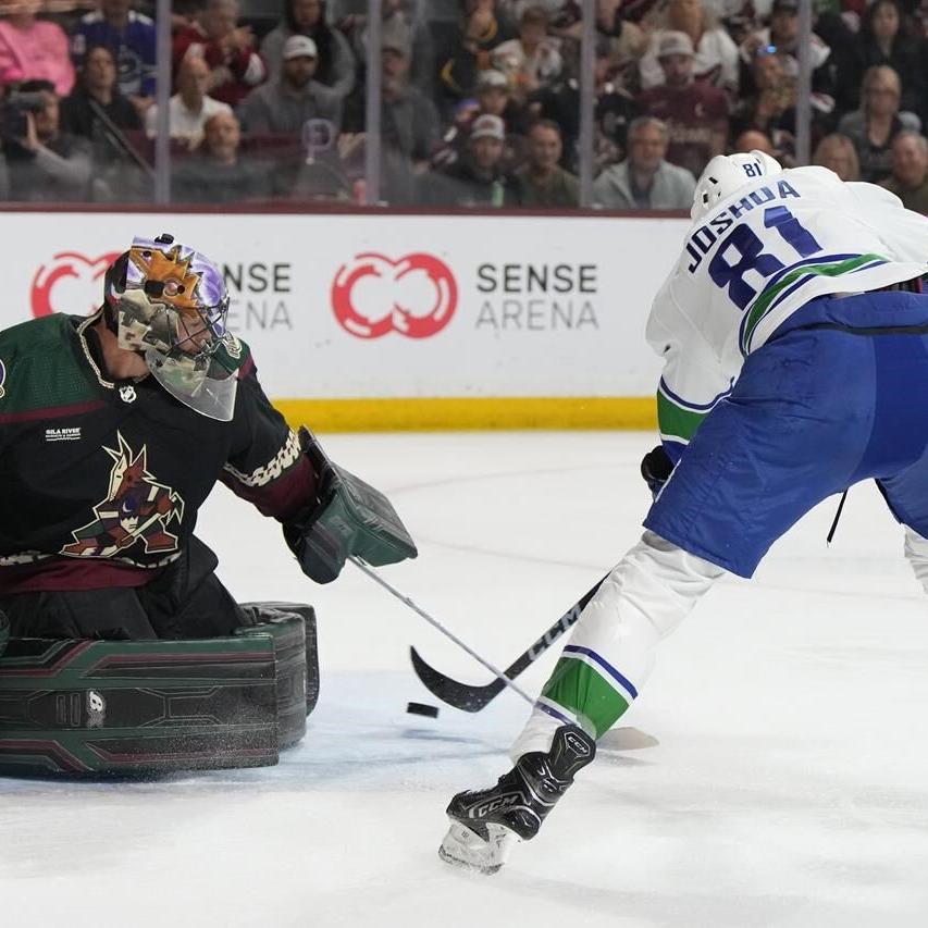 Canucks edge Coyotes in OT with Garland's 1st career hat trick