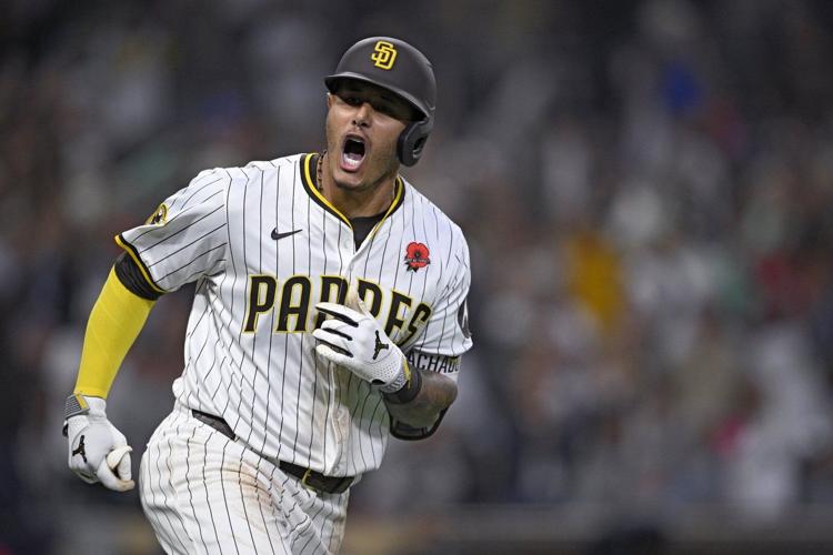 Machado hits tying homer in 8th inning and Padres come back to beat Marlins 4-3 in 11