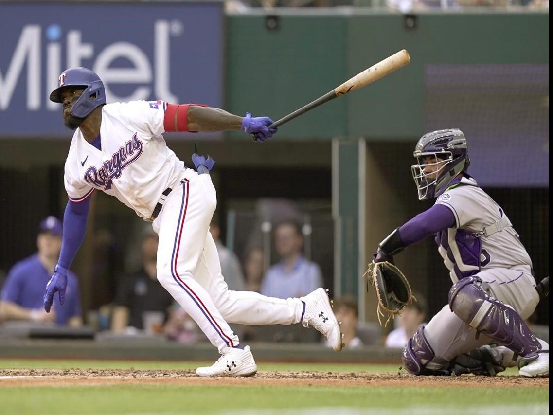 Martin Perez, Adolis Garcia lead Rangers past Rockies