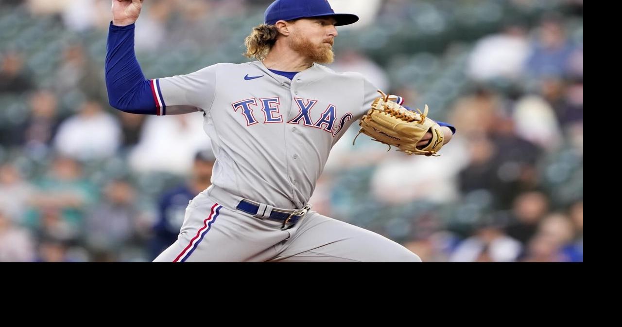 Rangers finally get to Gilbert, top Mariners 2-1 behind Gray