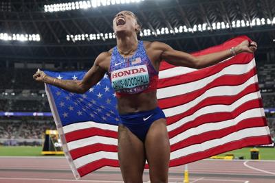 Long jumper Tara Davis-Woodhall explains tears during national anthem: 'I do believe in my country'