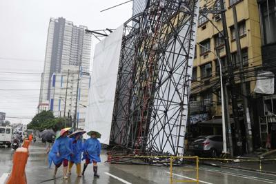 Tropical storm Wipha threatens southern China after battering Taiwan and the Philippines