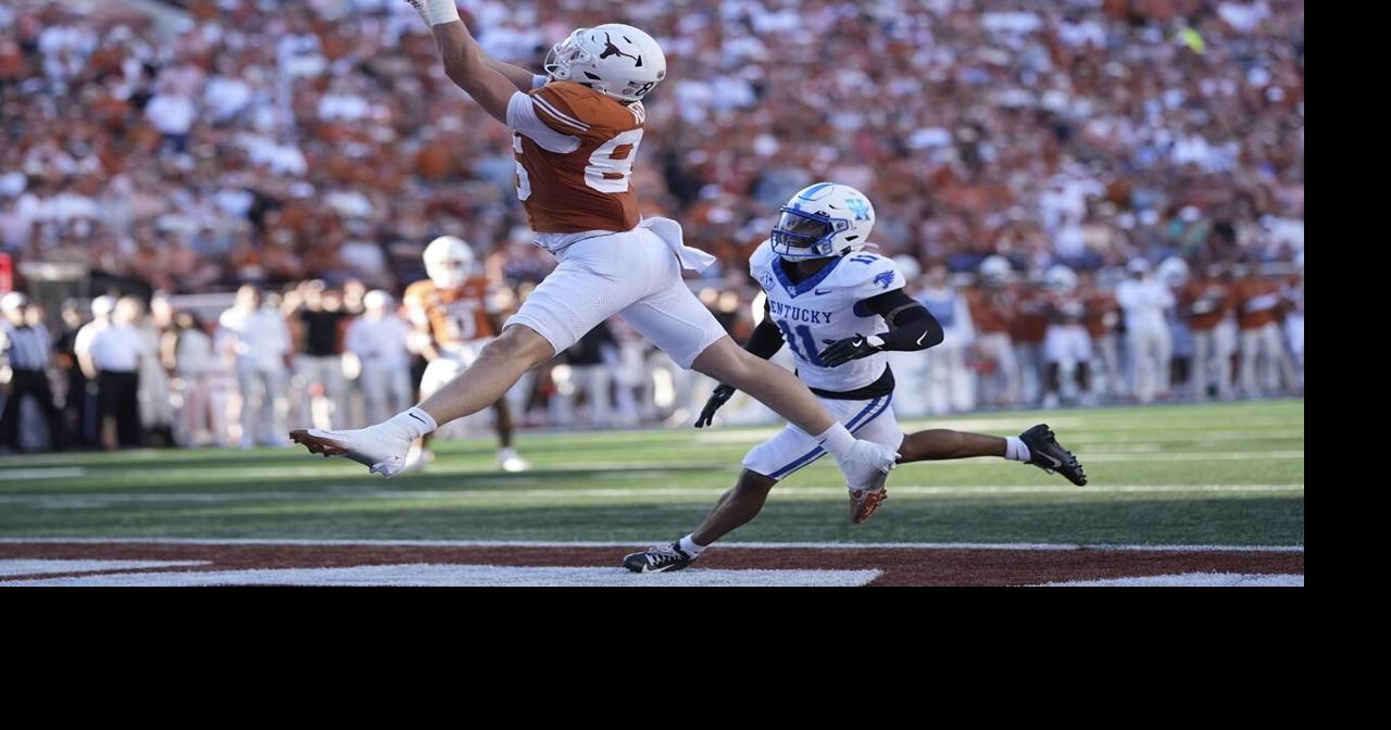 Helm's 2 TD catches power No. 3 Texas over Kentucky 31-14 to keep ...