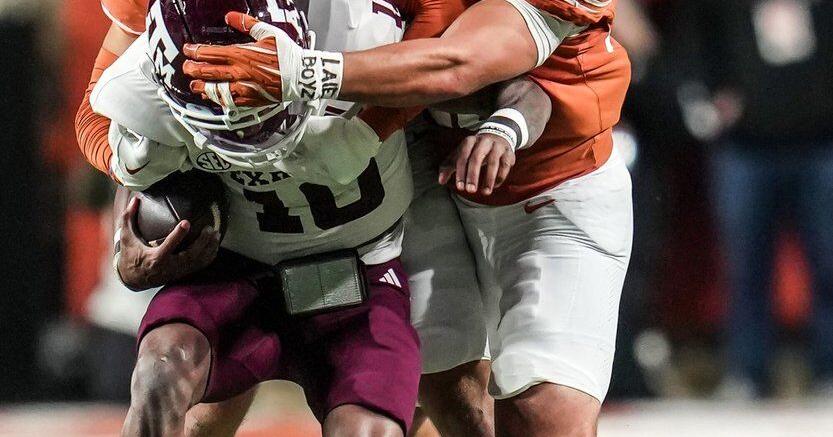 Texas A&M's perfect season spoiled by rival Texas, but playoffs await for the Aggies