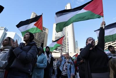 Thousands of protesters take over downtown Toronto streets