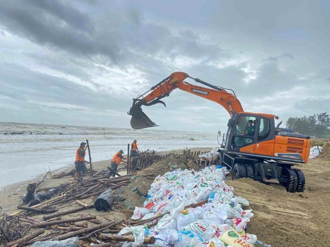 Vietnam evacuates thousands and shuts airports as Typhoon Bualoi makes
