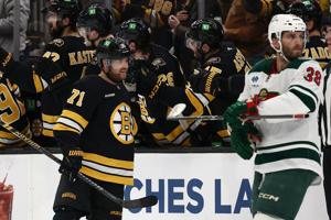 Pavel Zacha scores twice as Bruins beat Minnesota 6-3, spoiling Wild's chance to clinch playoff spot