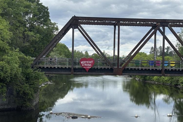 Hikers and cyclists can now cross Vermont on New England's longest rail trail, a year after floods