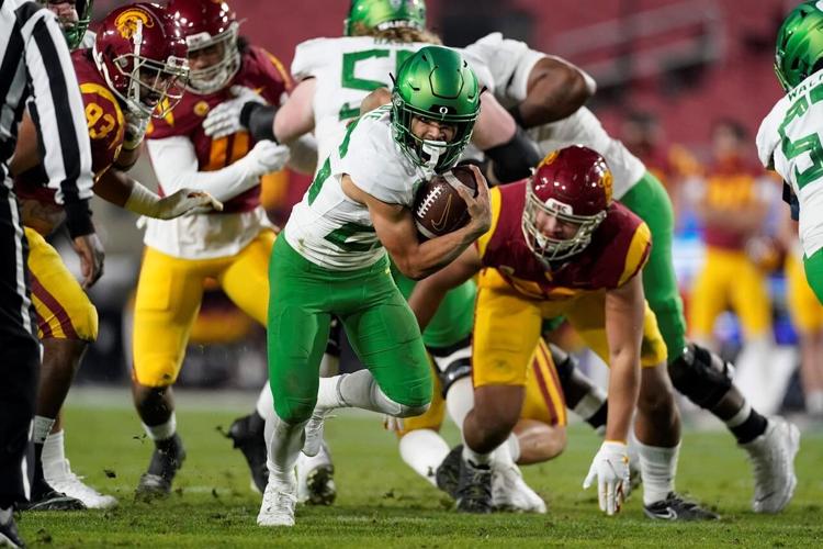 Oregon holds off USC late, grabs Pac12 title with 3124 win