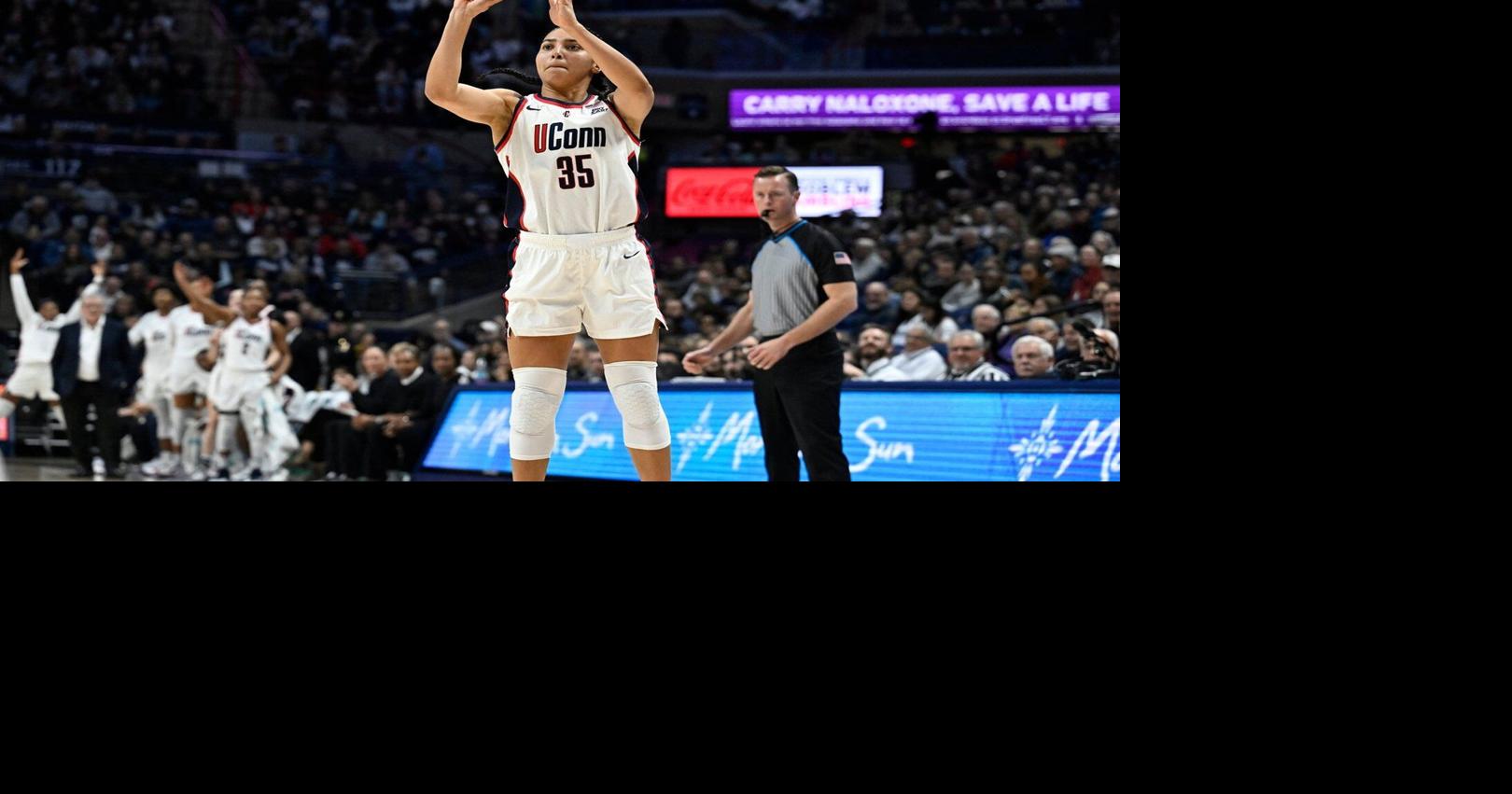 UConn’s 23 steals lead top-ranked Huskies past DePaul on a day when Sue Bird’s number is retired