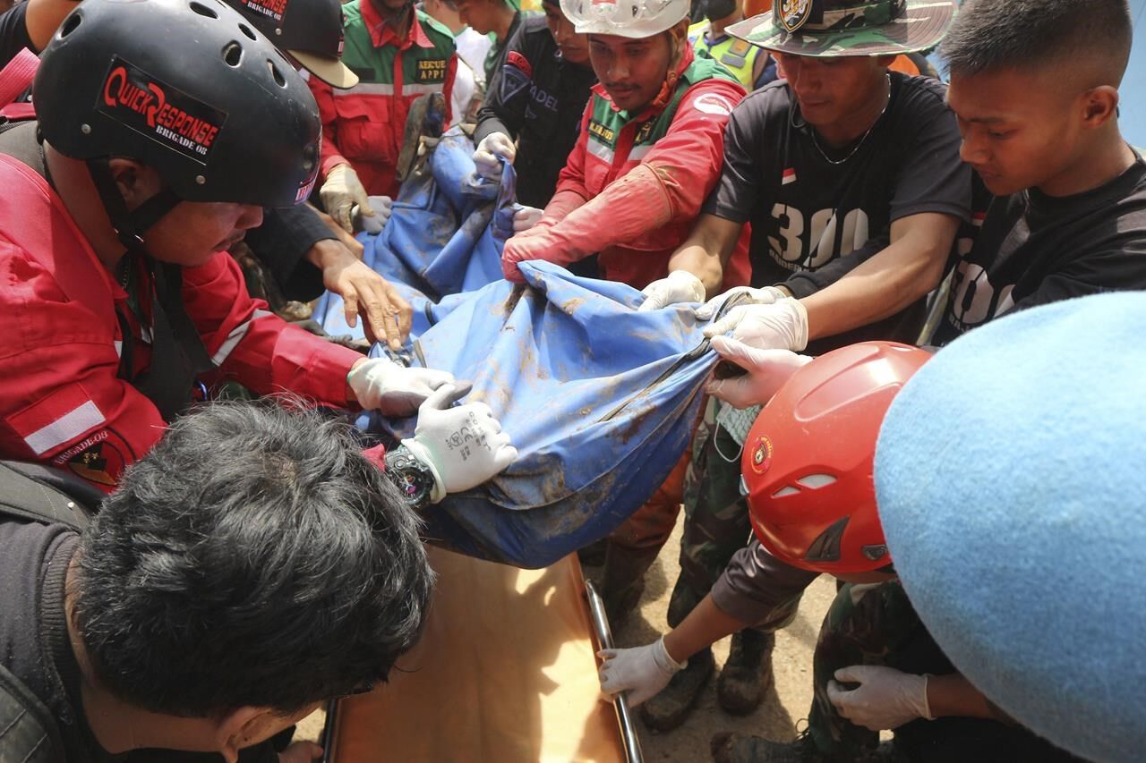 Indonesian Rescuers Search Through Rubble Of Quake; 268 Dead