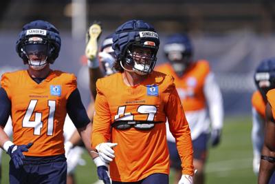 Broncos linebacker Drew Sanders carted off practice field with right leg injury
