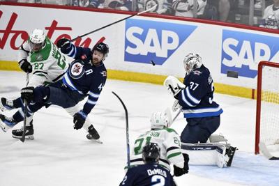 Jets star defenceman returns to play key role in Winnipeg's Game 2 win over Dallas