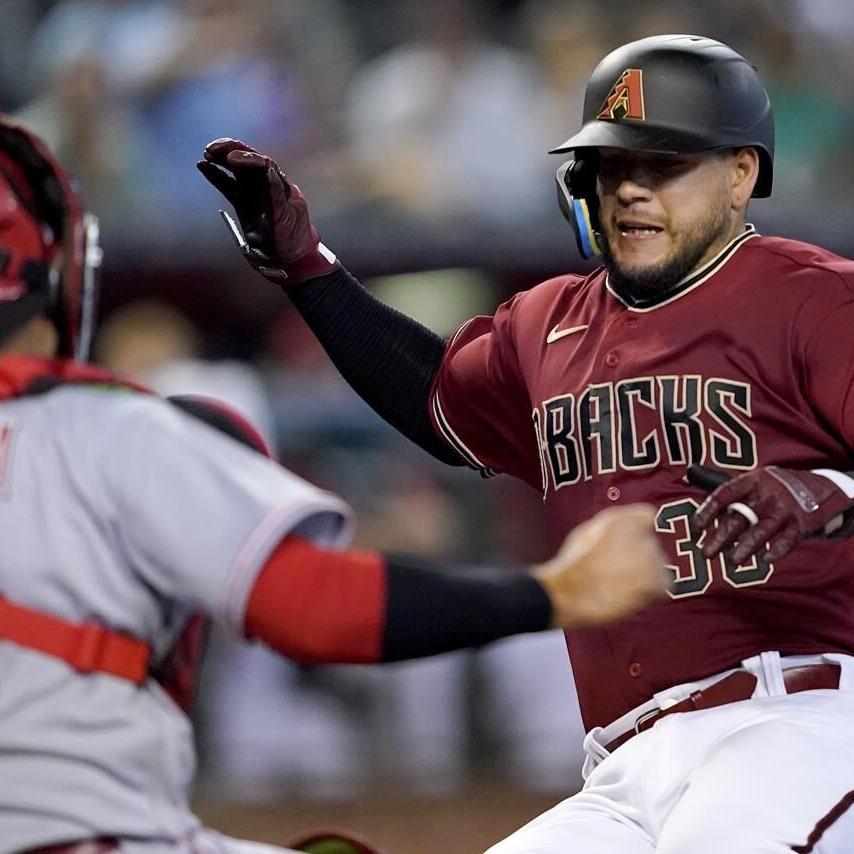 Gallen settles down after wild start, D-backs top Reds 7-4