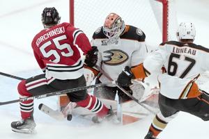 Blackhawks D Kevin Korchinski rejoins team after father's death