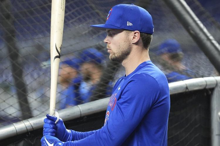 NL Central-leading Cubs activate Happ from injured list, option Ballesteros to Iowa