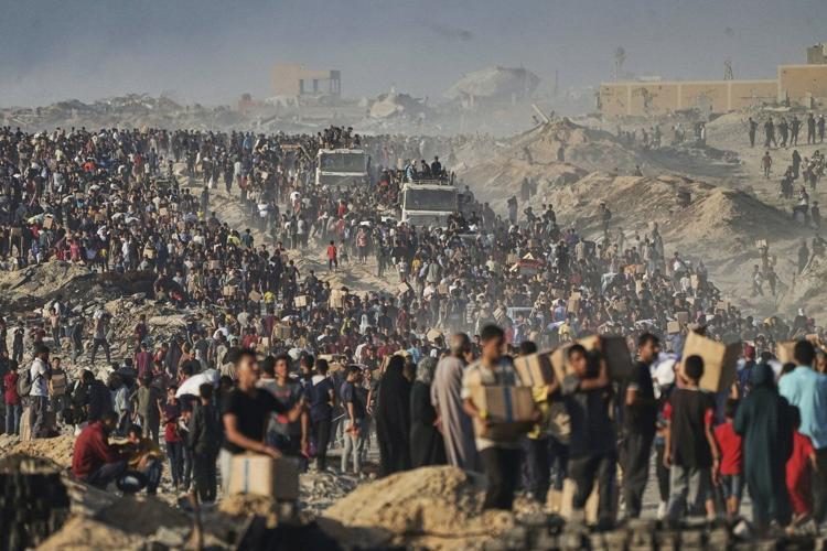 Israel says hundreds of truckloads of aid are waiting to enter Gaza. Why can't the UN bring them in?