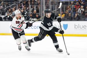 Clarke scores twice, Kuemper makes 23 saves in Kings' 6-0 romp over Blackhawks