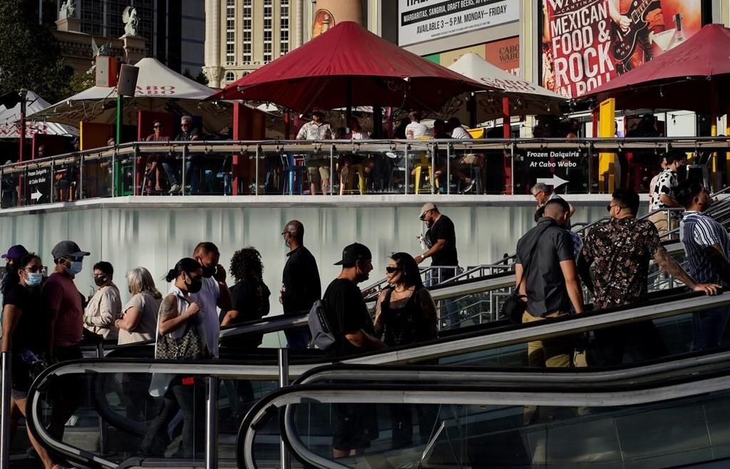 Vegas hitting jackpot as pandemic-weary visitors crowd back - OPB