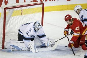 Weegar enjoys ovation, tribute in first game back in Calgary