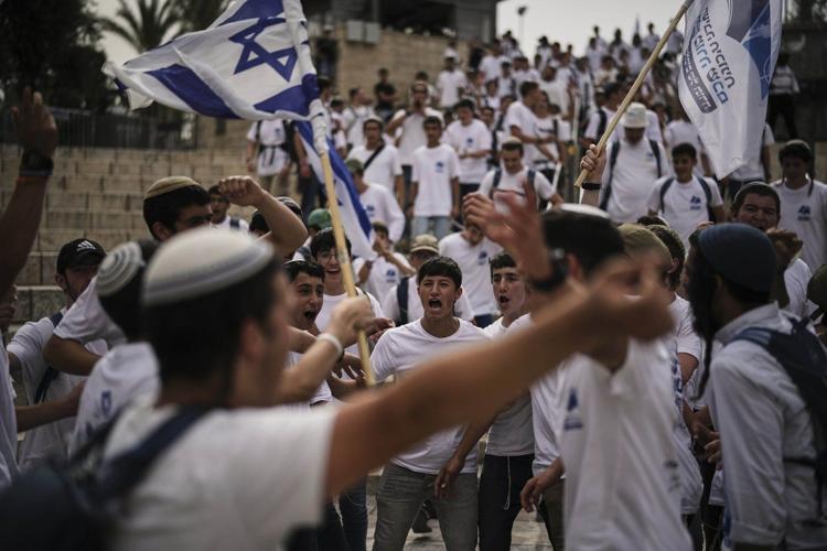 AP PHOTOS: Israeli nationalists march through Jerusalem