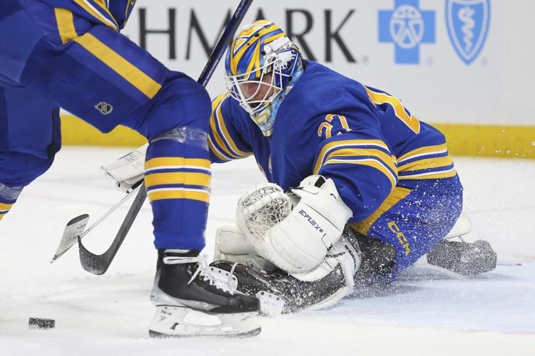 Kreider scores twice in Rangers' season-opening 5-1 win over Sabres