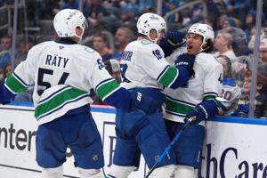 Sherwood has hat trick, DeBrusk scores in shootout as Canucks beat Blues 4-3